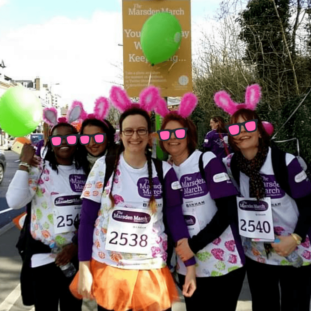 The 5 Bouncing Pink Bunnies, wearing their Marsden March shirts, black leggings and pink bunny ears at the half-way mark of Marsden March, Chronically Hopeful