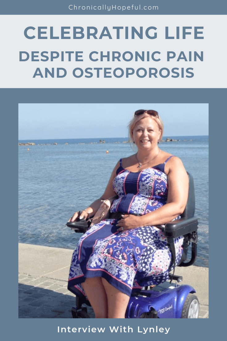Title reads, Celebrating Life despite chronic pain and Osteoporosis, Interview with Lynley. Below is a photo of a lady wearinga blu dress, sitting in a power chair at the beach with the sea in the background,pin by Chronically Hopeful