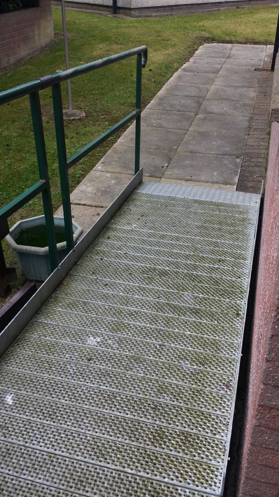 a photo of the ramp leading to the back door of our old flat