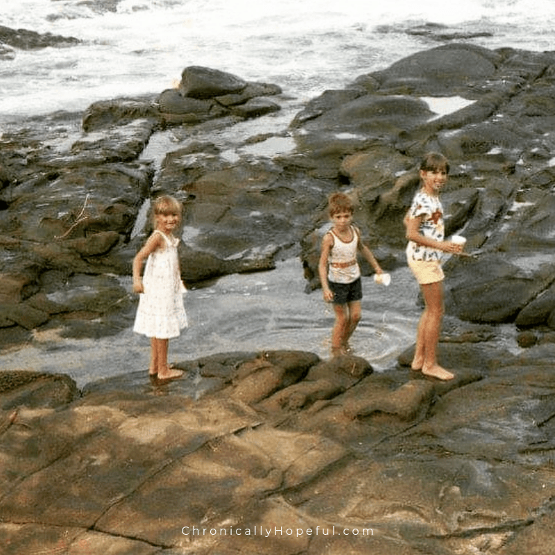 Char and her cousins exploring rock pools on a beach in South Africa in the 80s