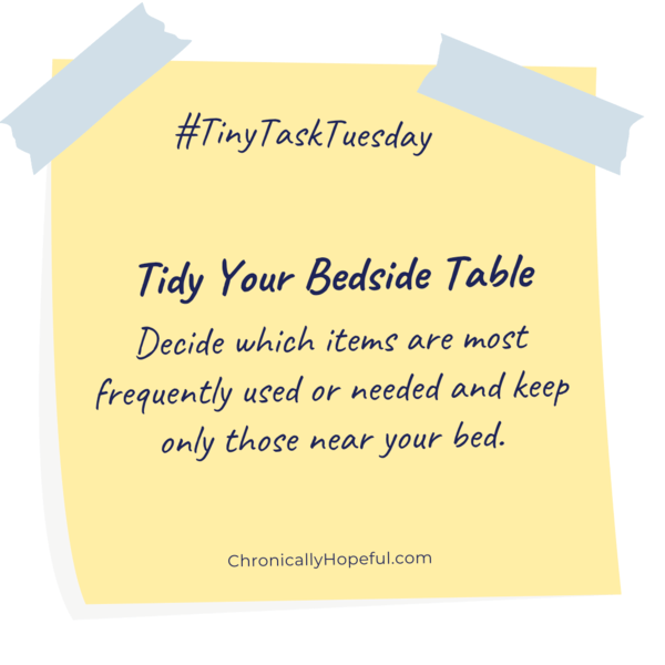 A post-it note with this week's Tiny Task Tuesday, Tidy your bedside table