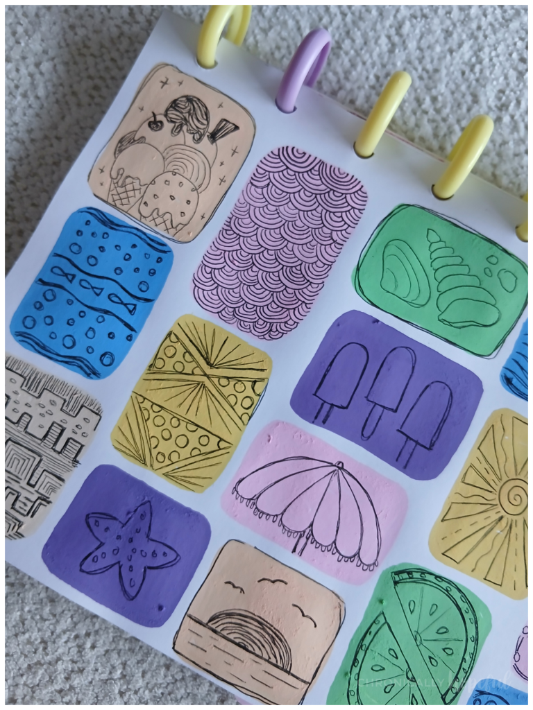 Seaside doodles on acrylic paint shapes