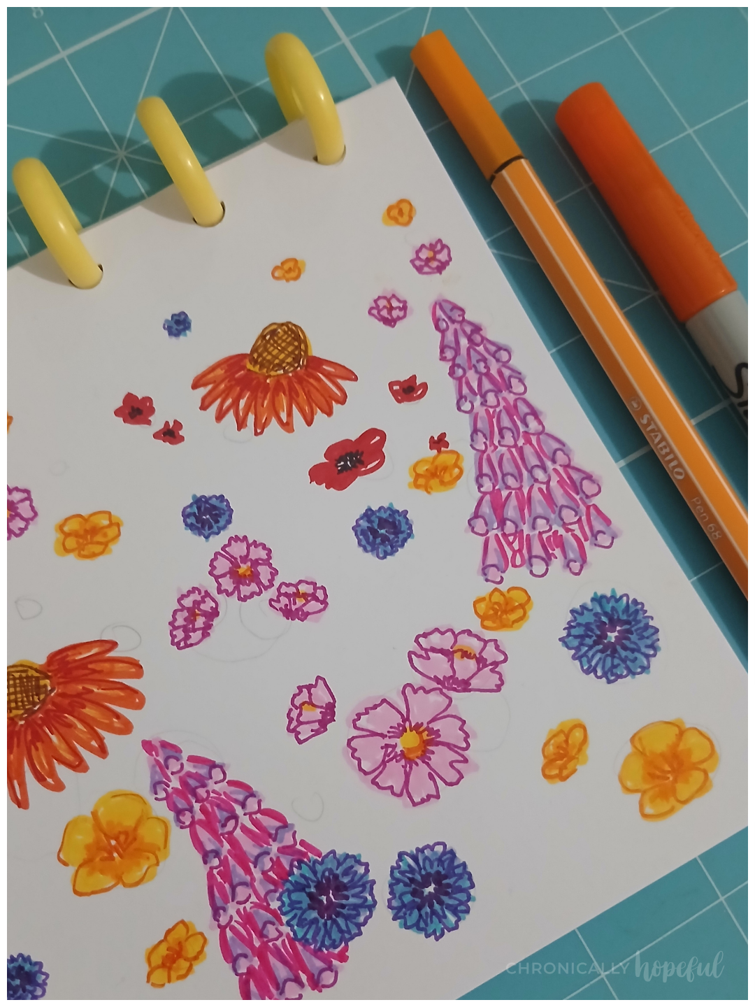 Summer blooms drawn with markers